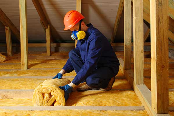 Installing fibre loft insulation