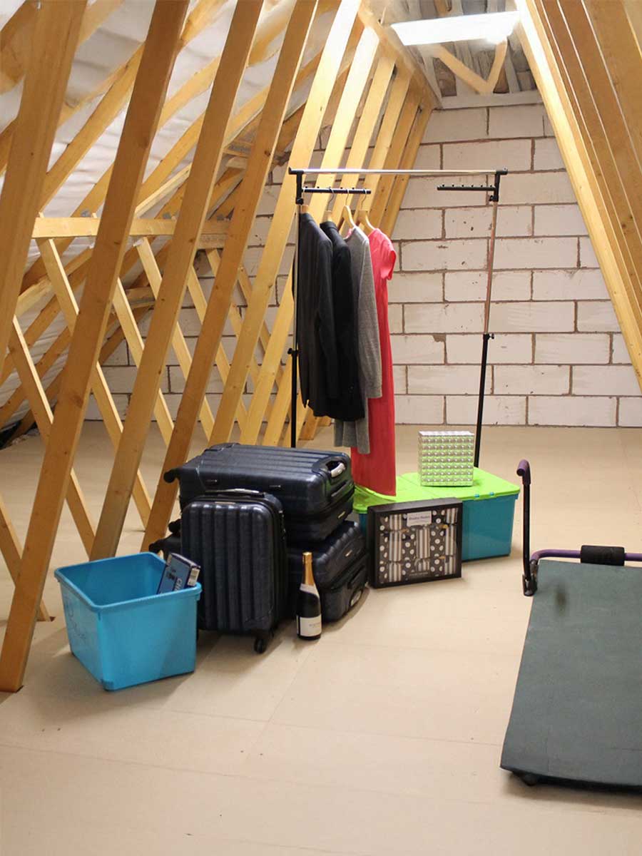 A raised loft boarding system has created lots of additional storage space in this attic
